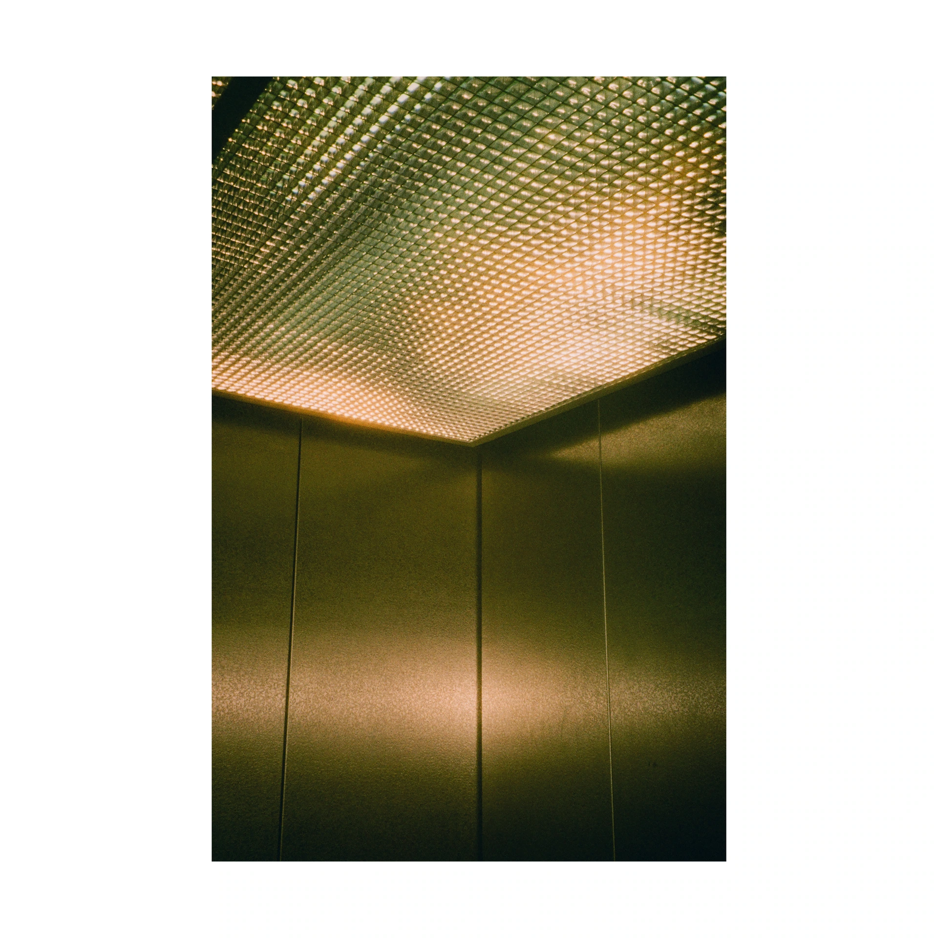 Metal walls and an illuminated lift ceiling