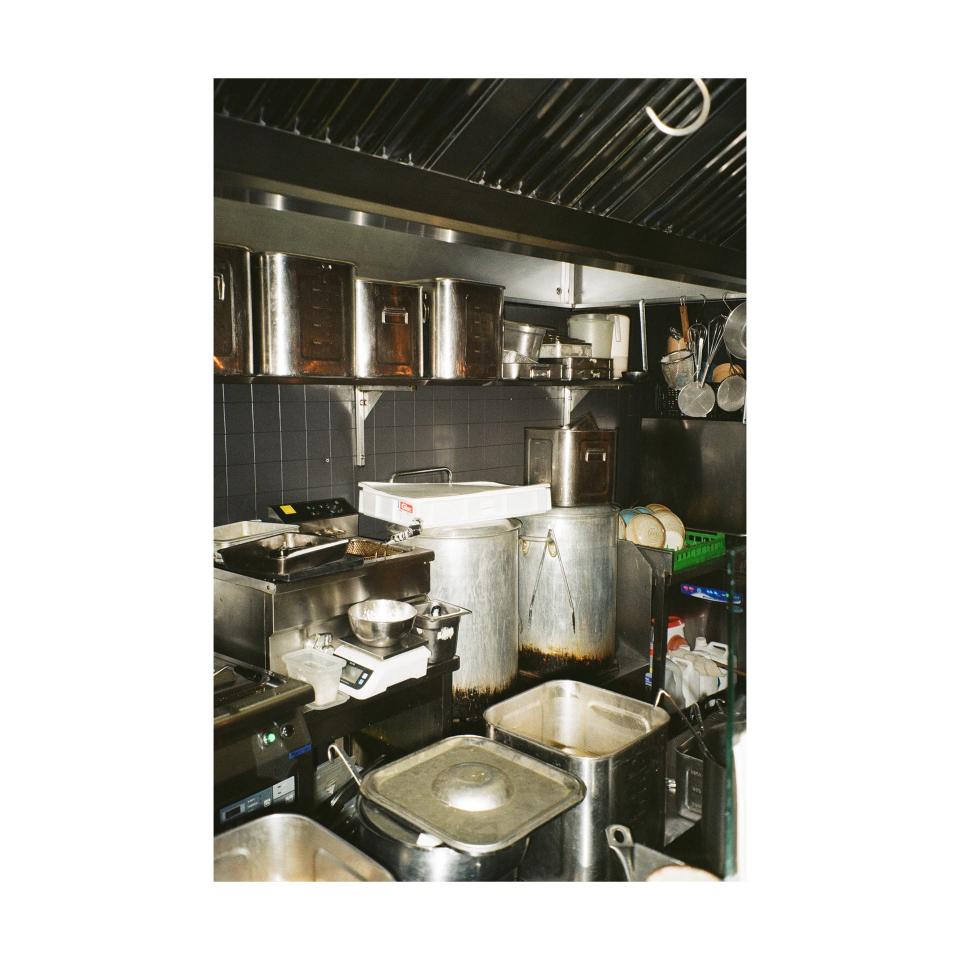 Pots and metal containers in a professional kitchen
