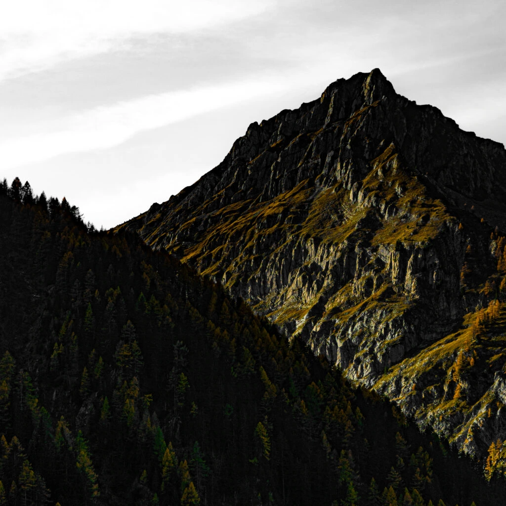A rocky ridge between light and shadow