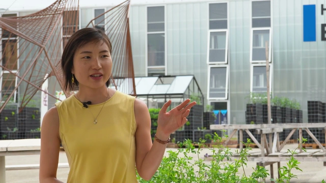 Kanaha Shoji being interviewed outside a campus building