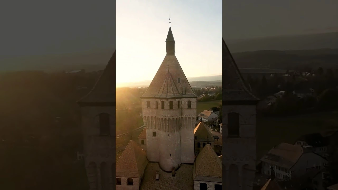 Aerial view of a tower and its surroundings at sunset