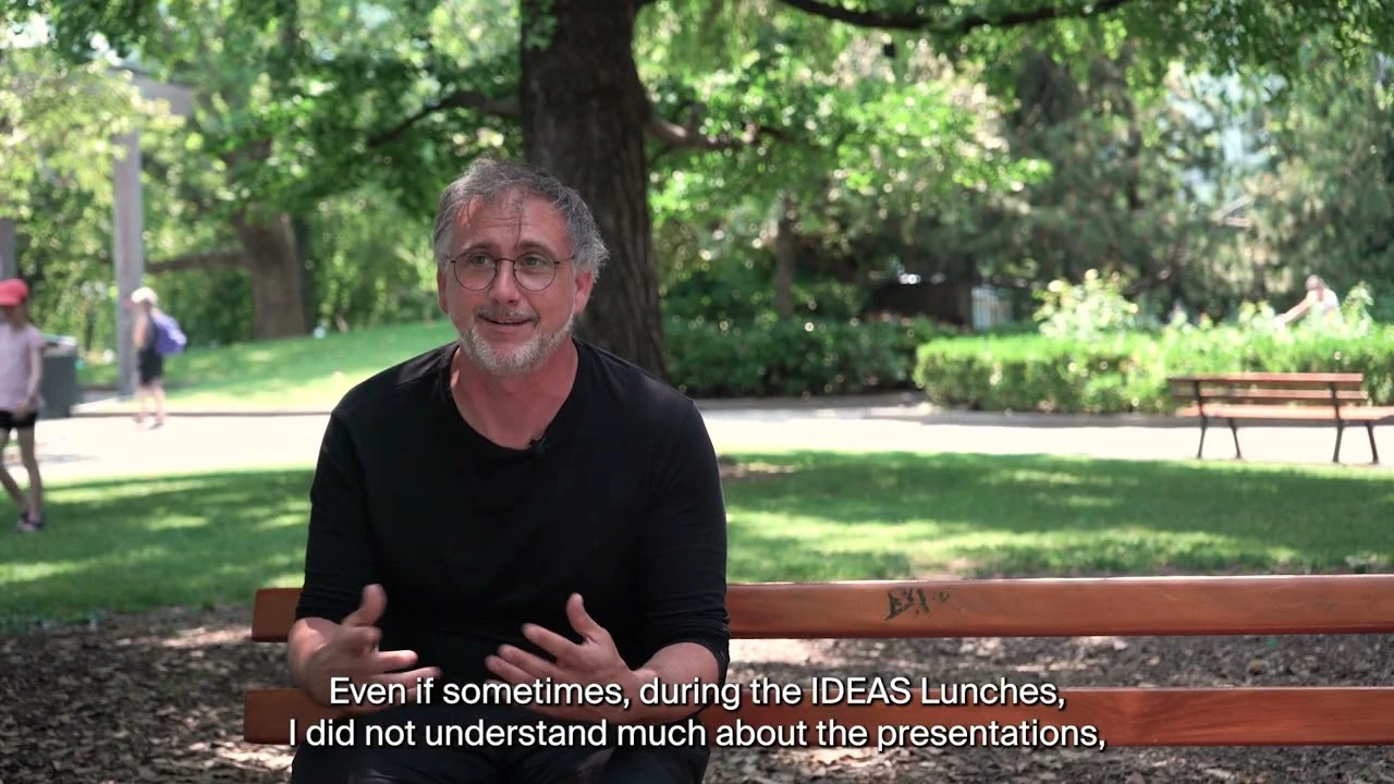 Loïc Fumeaux being interviewed in a park